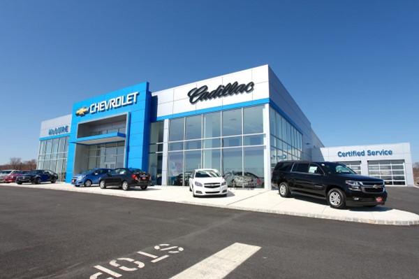 Front view of the showroom building of the McGuire Chevrolet Cadillac auto dealership construction project in NJ